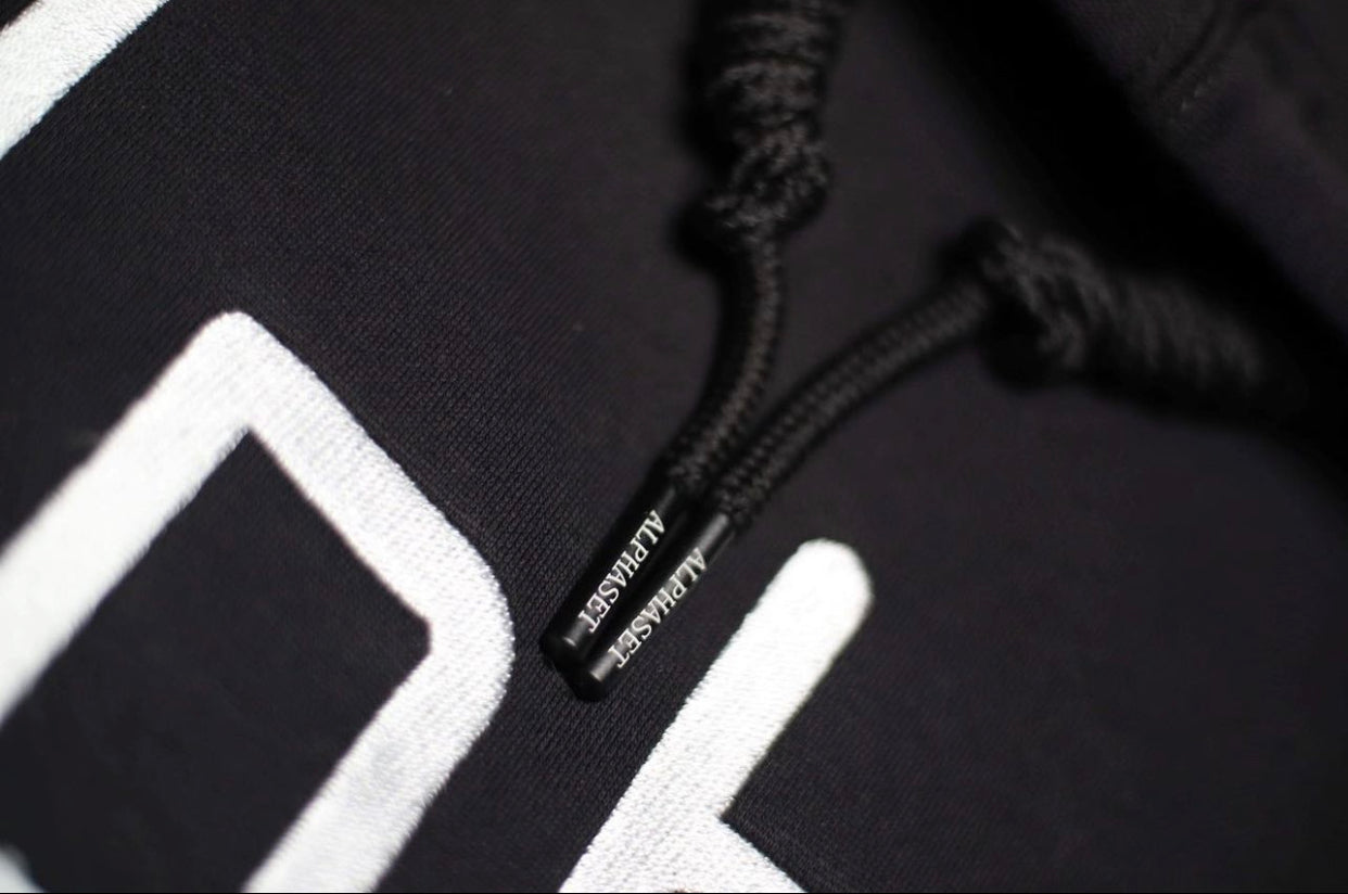 embodied black hoodie with branded drawstrings 